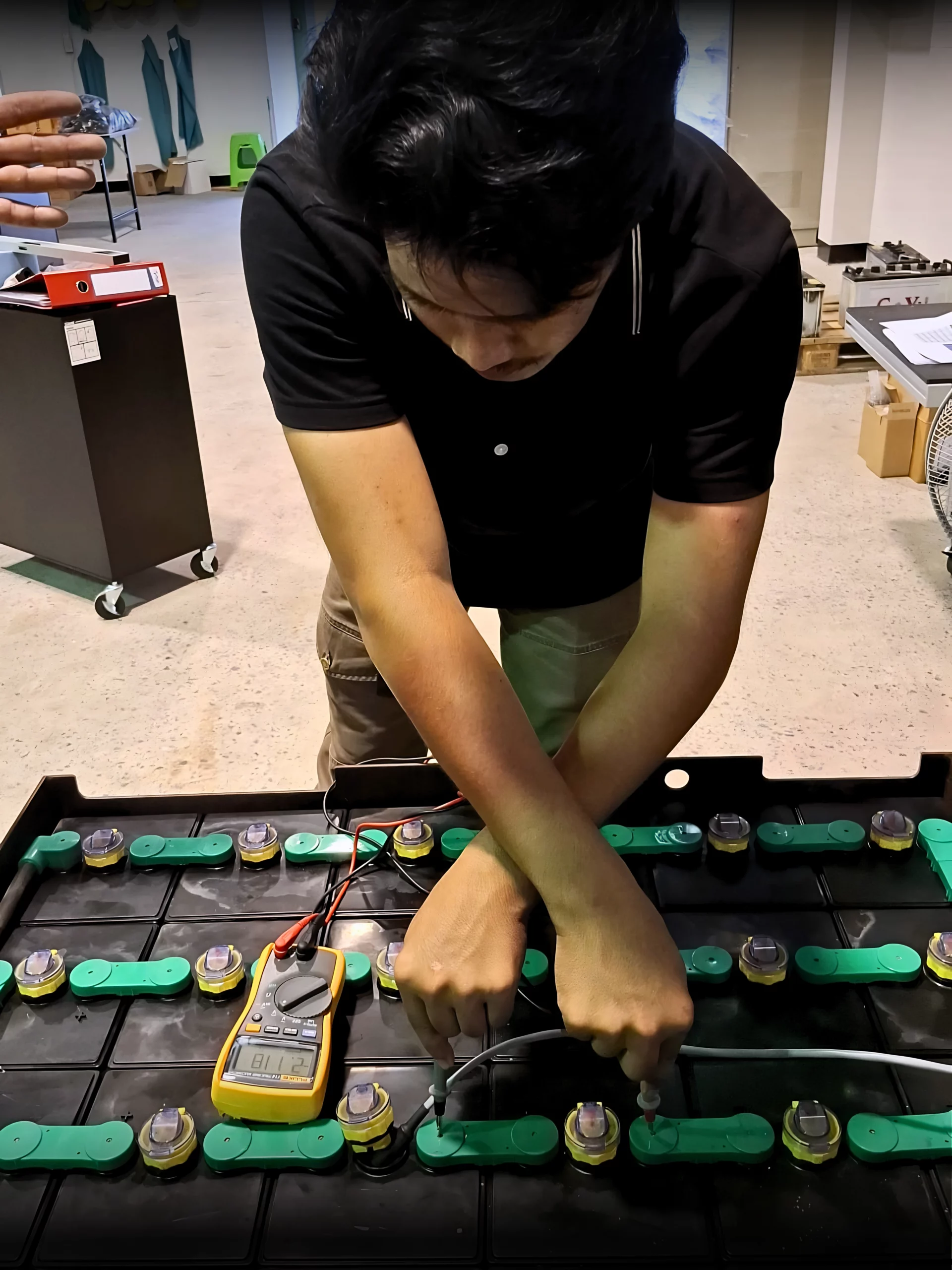 Technicians carrying out the battery regeneration process in Thailand