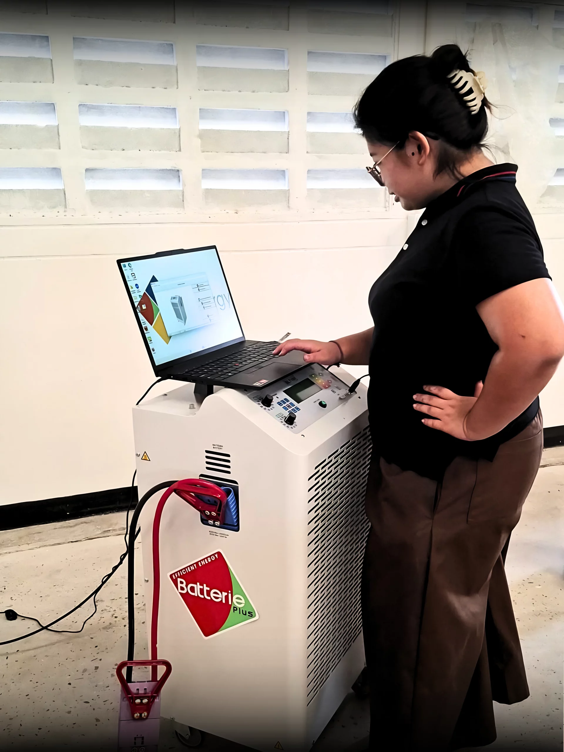 Technicians performing industrial battery regeneration at Be Energy Thailand in Bangkok